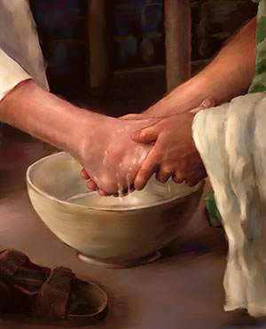 He poured water in a basin and washed the feet of His disciples.