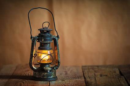 The Campbells didn't have any electric light so they just used an oil lamp set in the middle of the table.