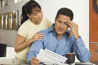 husband and wife talking over financial decisions