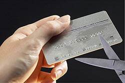 If you have a problem with credit card debt, cut the card into tiny pieces