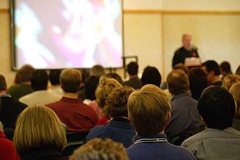 a group of people attending a church service